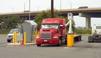 An 18-wheeler stationed at a truck stop.