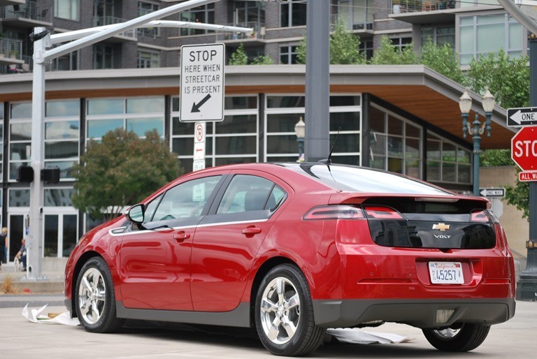 A photo of a red Chevy Volt electric vehicle.
